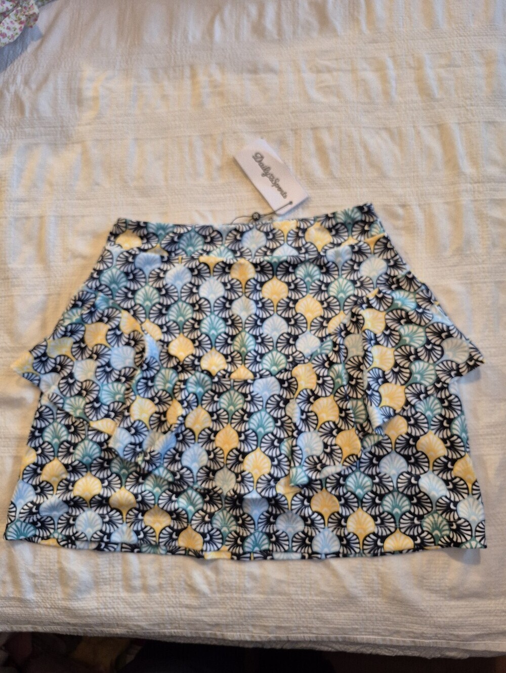 Daily Sports women's Small Navy Fia Skort golf activewear skort Fan pattern NWT